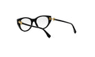 A pair of black cat-eye framed glasses with gold accents.