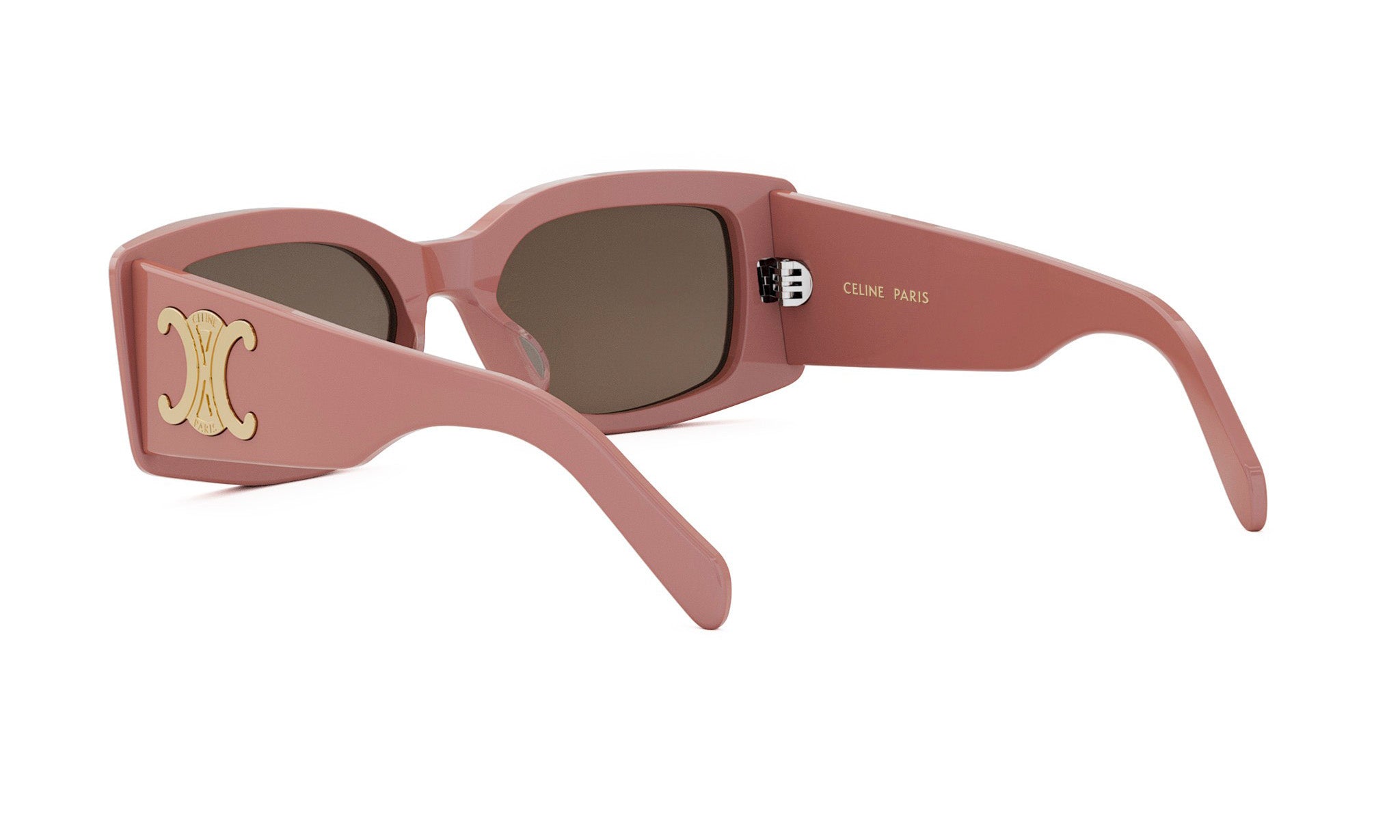 A pair of pink sunglasses with a gold logo on the frame.