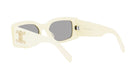A pair of white sunglasses with a gold logo on the frame.