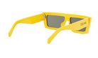 A pair of yellow sunglasses with the Celine logo on the frame.