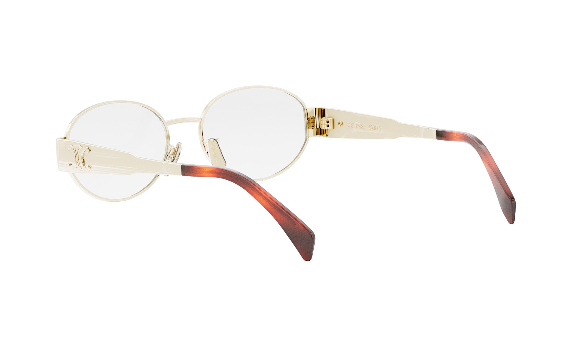 A pair of gold-colored, round-framed glasses with brown accents.