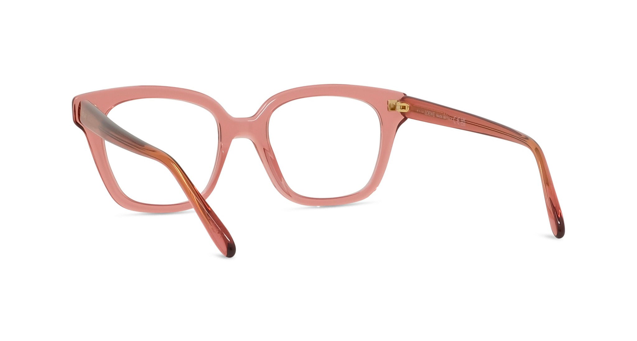 A pair of pink-framed glasses with a brown frame, positioned facing away from the camera.