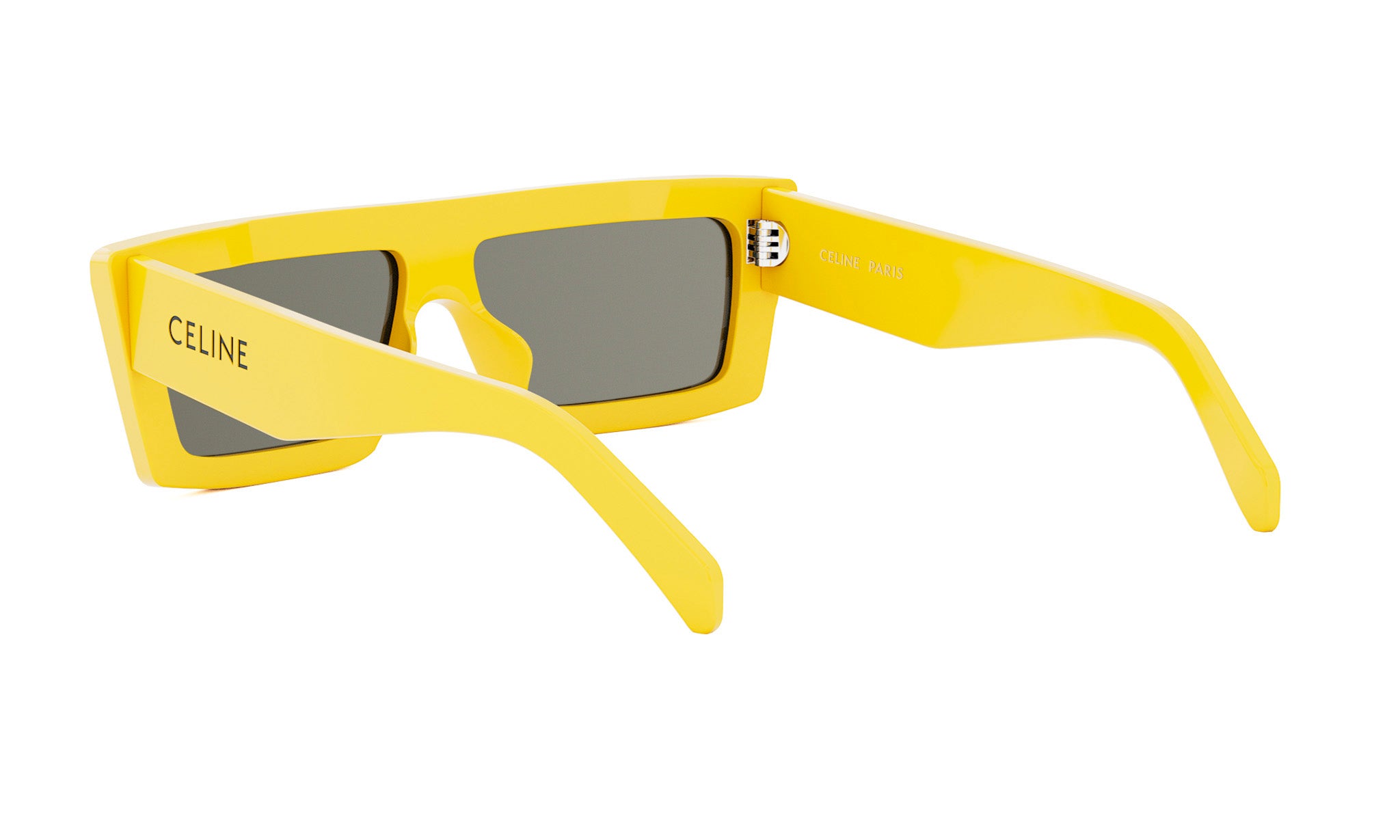 A pair of yellow sunglasses with the Celine logo on the frame.
