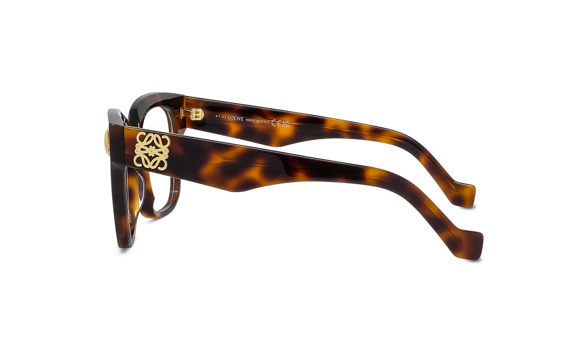 A pair of stylish tortoiseshell-framed glasses with a gold-colored logo on the temples.