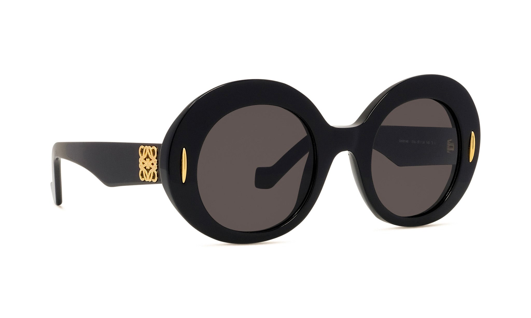 A pair of black round sunglasses with gold accents.