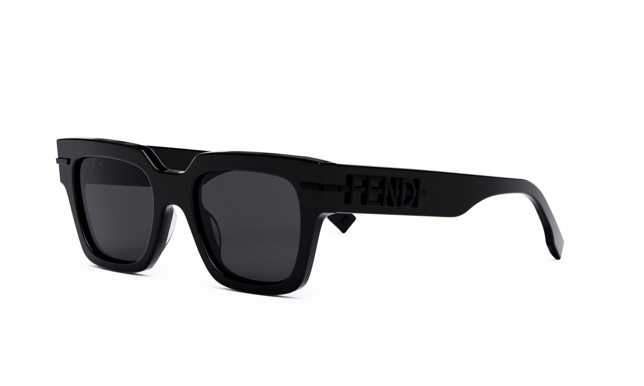 A pair of black sunglasses with the Fendi logo on the frame.