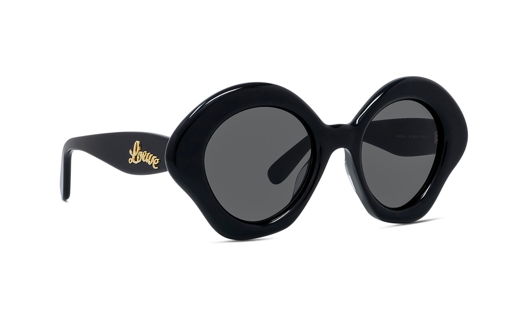 A pair of black, round sunglasses with a gold logo on the frame.