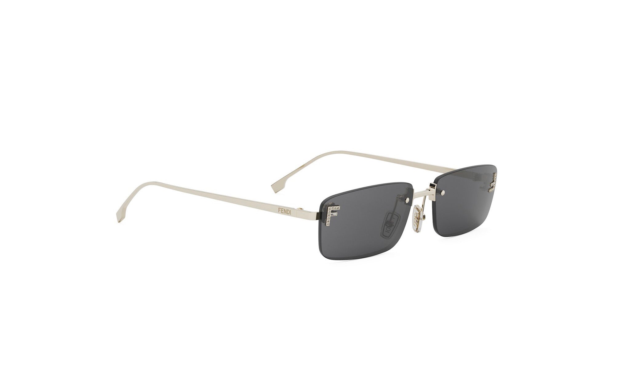 A pair of silver-framed sunglasses with dark lenses.