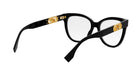 A pair of black-framed glasses with gold accents, including a logo on the temples.