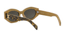 A pair of tan-colored sunglasses with a leopard print frame and dark lenses.