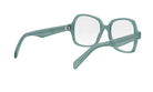 A pair of green-framed glasses with a white lens, positioned in a way that allows the viewer to see the top of the frame.