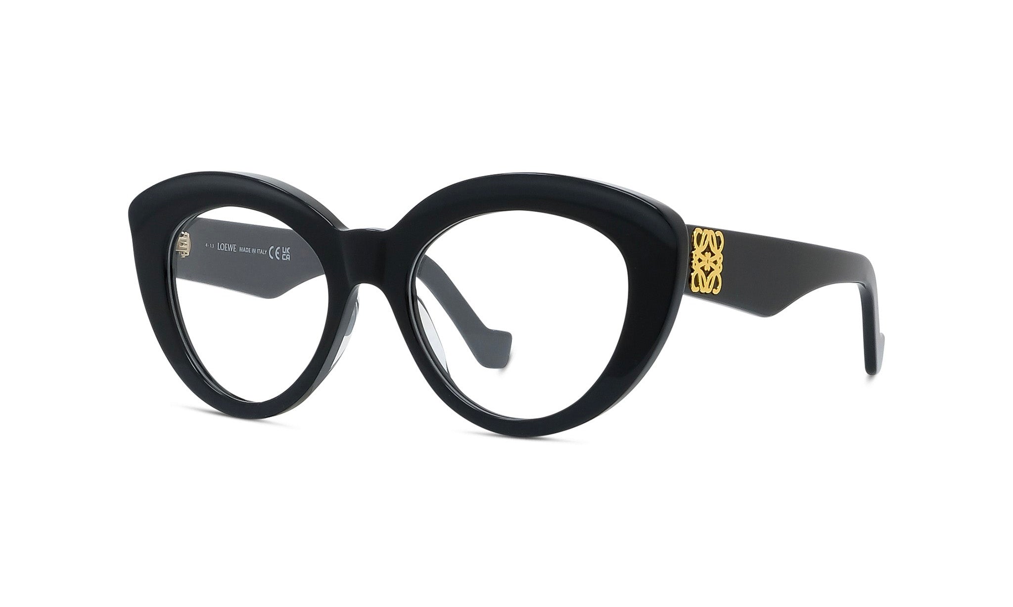 A pair of black cat-eye framed glasses with a gold logo on the side.