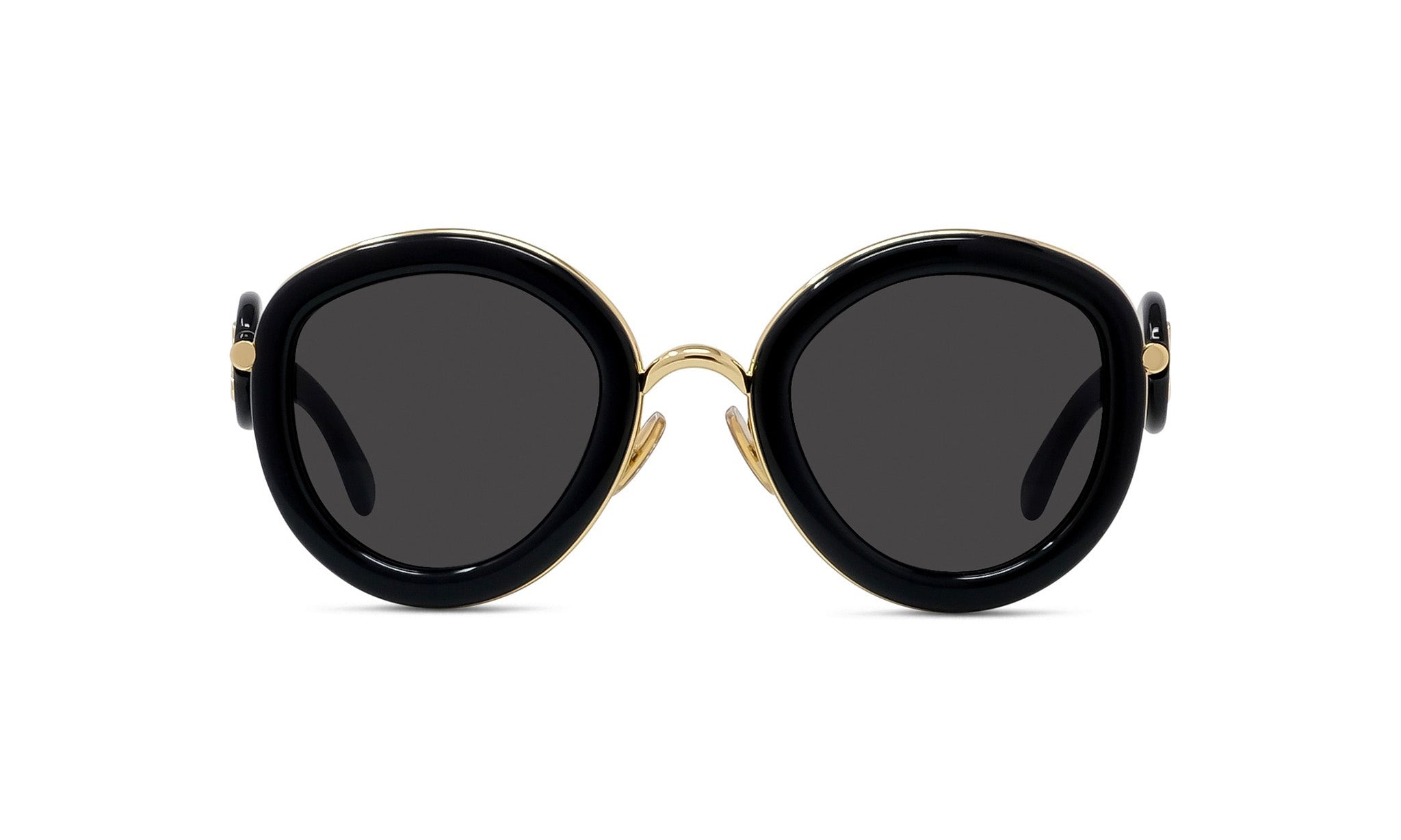 A pair of stylish black sunglasses with gold accents.