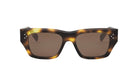 A pair of tortoiseshell sunglasses with dark brown frames and dark brown lenses.