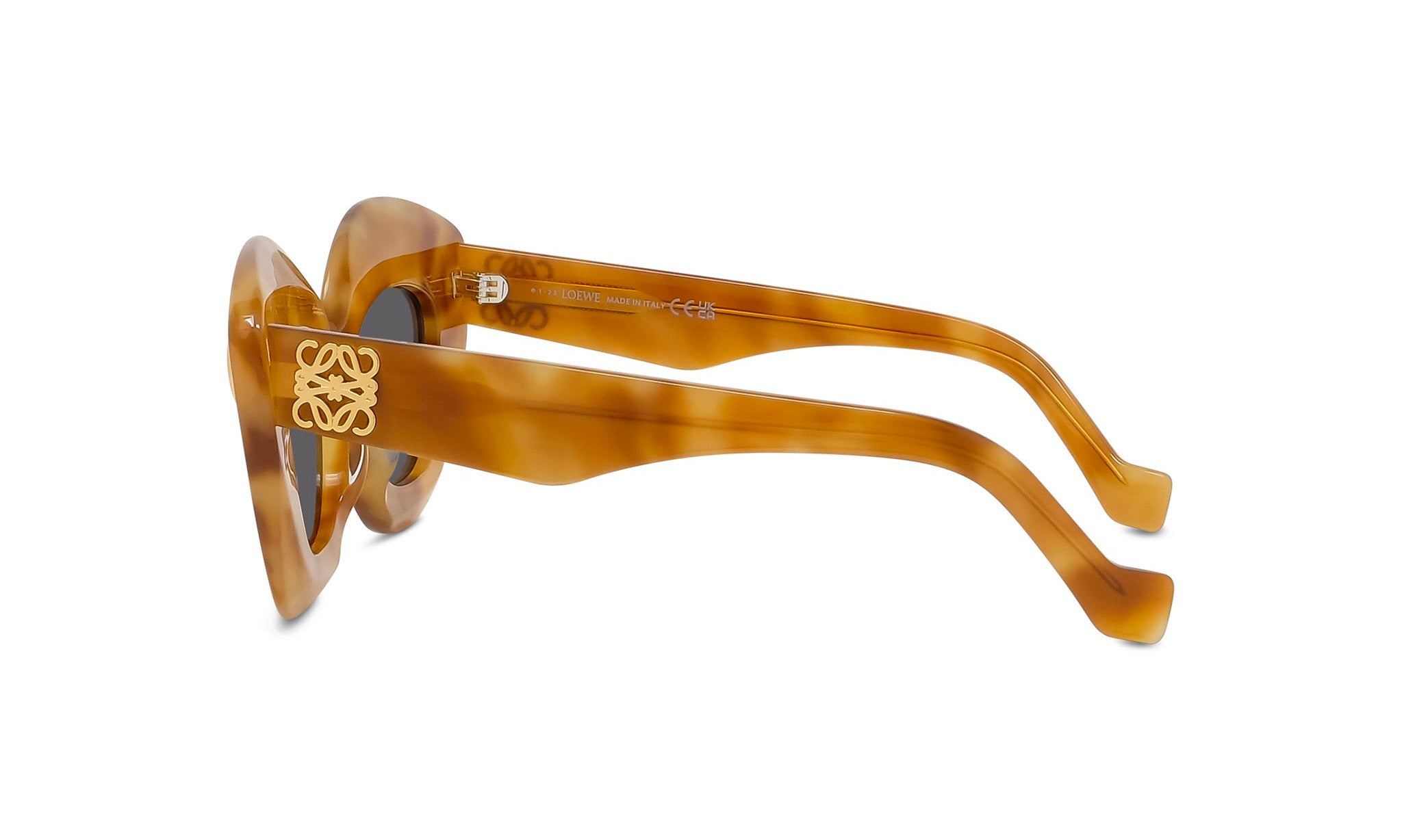 A pair of stylish sunglasses with a gold-colored frame and dark lenses.