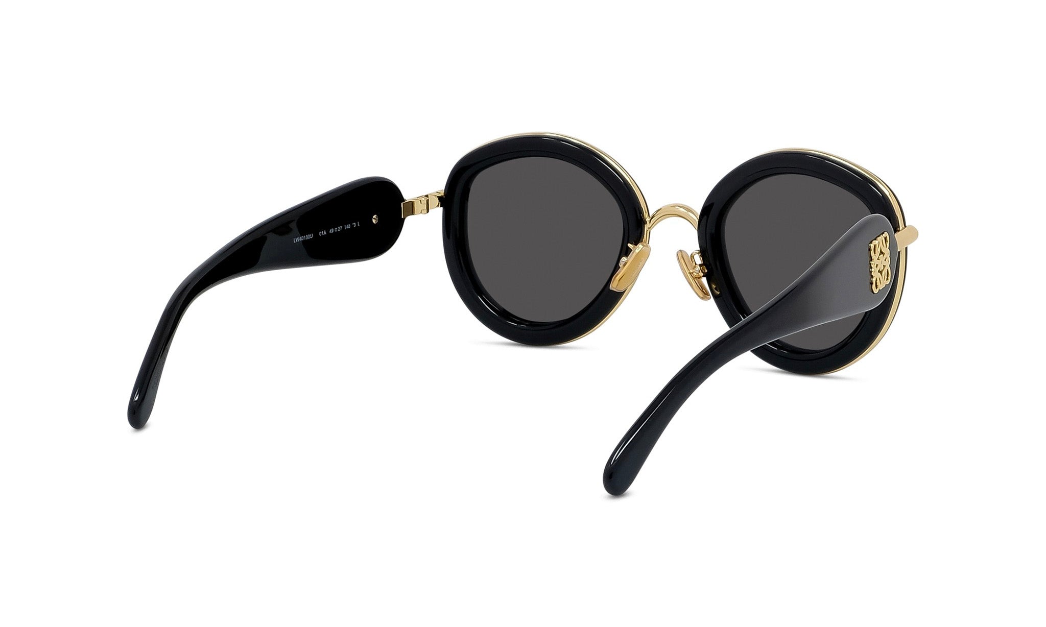 A pair of black sunglasses with gold accents, featuring a round frame and dark lenses.