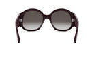 A pair of dark-colored sunglasses with a gradient lens design.