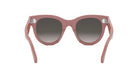 A pair of pink cat-eye sunglasses with dark lenses.