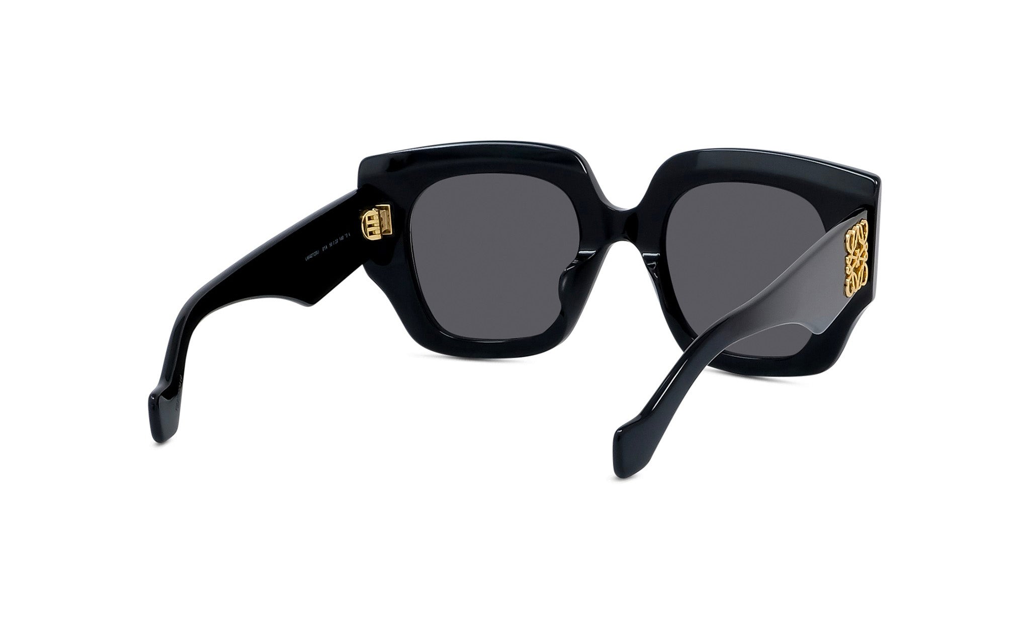 A pair of black sunglasses with gold accents.