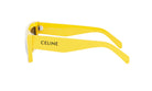 A pair of yellow sunglasses with the Celine logo on the frame.