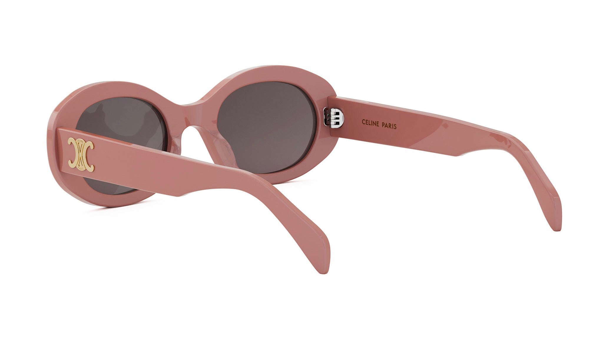 A pair of pink sunglasses with a gold logo on the frame.