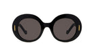 A pair of black, round sunglasses with dark lenses.
