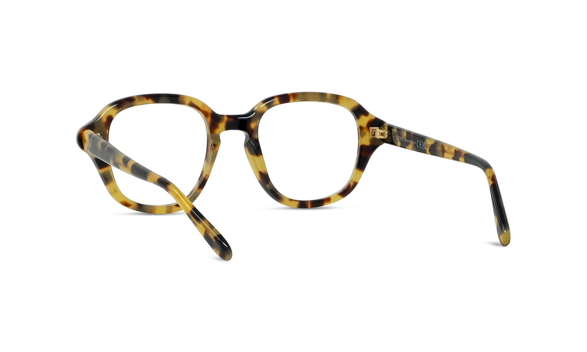 A pair of tortoiseshell-framed glasses with a gold-colored metal accent.