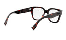A pair of tortoiseshell-framed glasses with a dark frame and red accents.