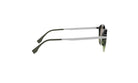 A pair of dark green-framed sunglasses with a white frame, positioned side by side against a white background.