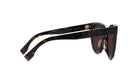 A pair of sunglasses with the Fendi logo prominently displayed on the frame.