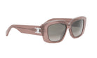 A pair of stylish sunglasses with a tan frame and dark lenses.