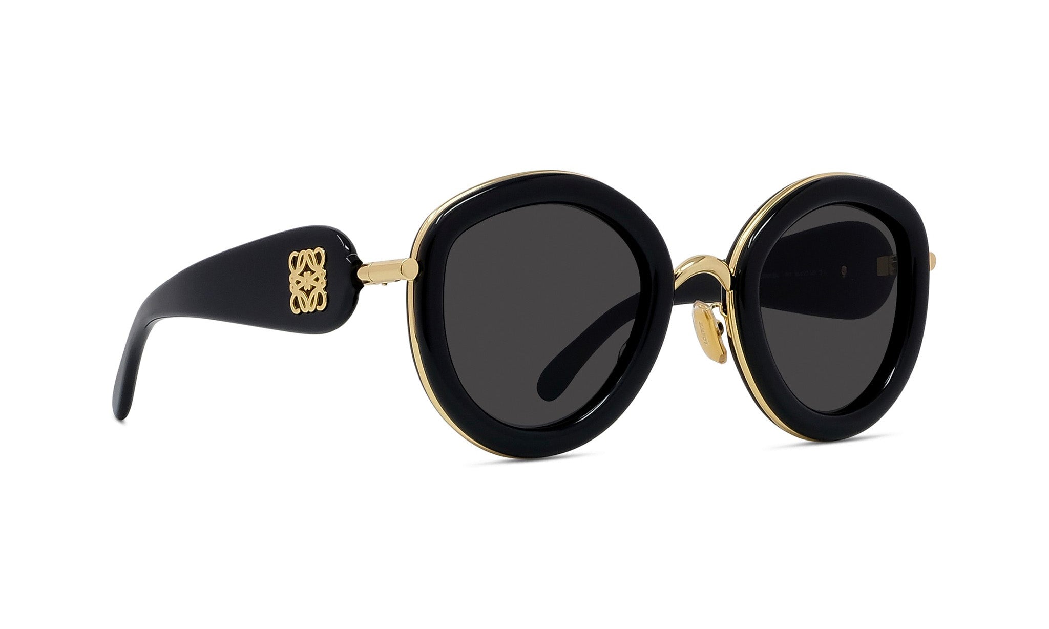 A pair of stylish black sunglasses with gold accents.