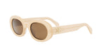 A pair of cream-colored sunglasses with a distinctive logo on the frame.
