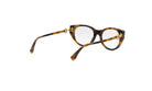 A pair of tortoiseshell-framed glasses with gold-colored metal accents.