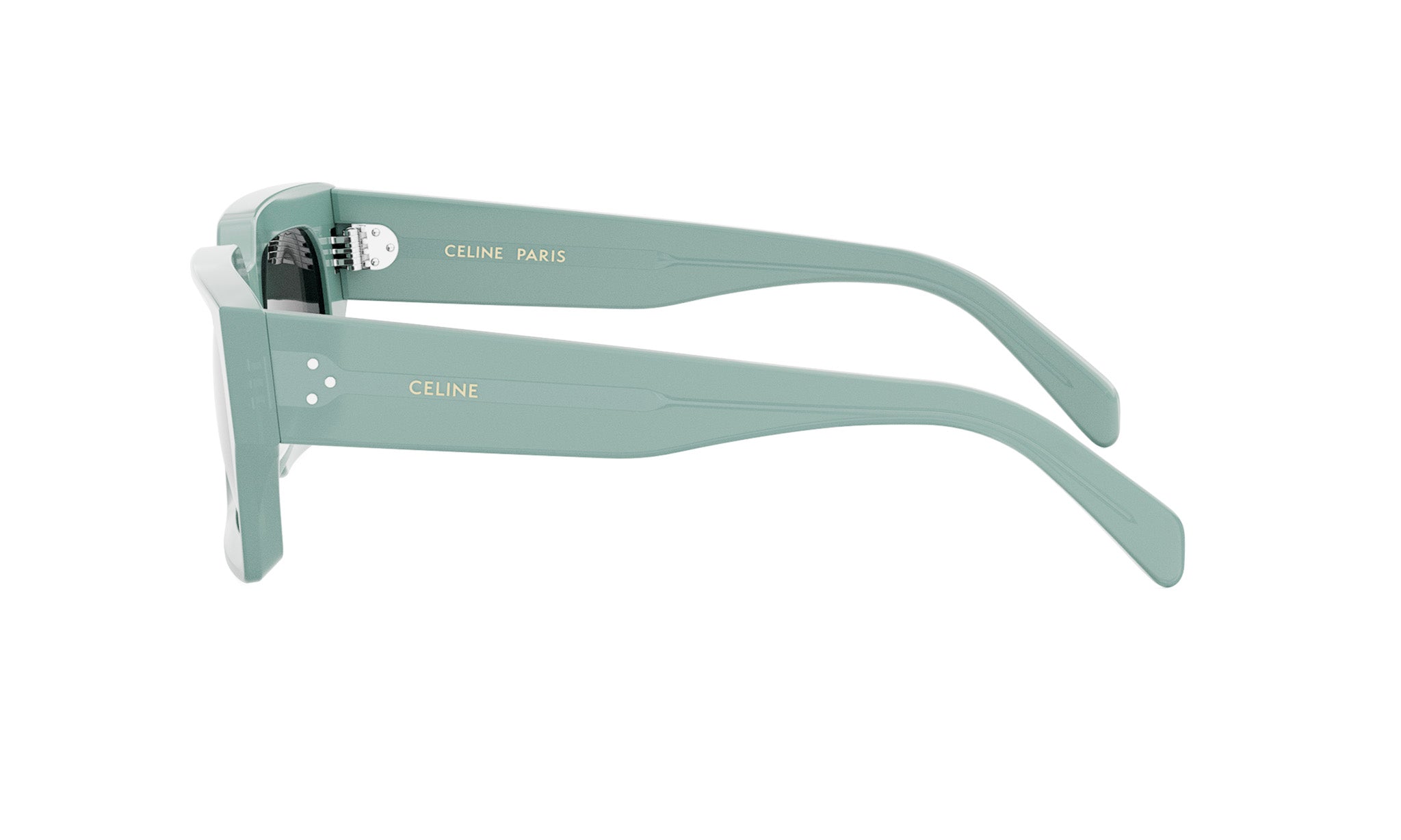 A pair of light green sunglasses with the Celine Paris logo visible on the temples.