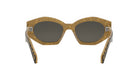 A pair of stylish sunglasses with a unique, animal print frame.