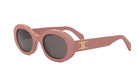 A pair of pink sunglasses with a gold logo on the frame.