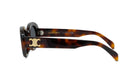 A pair of sunglasses with a tortoiseshell frame and a gold logo on the temples.