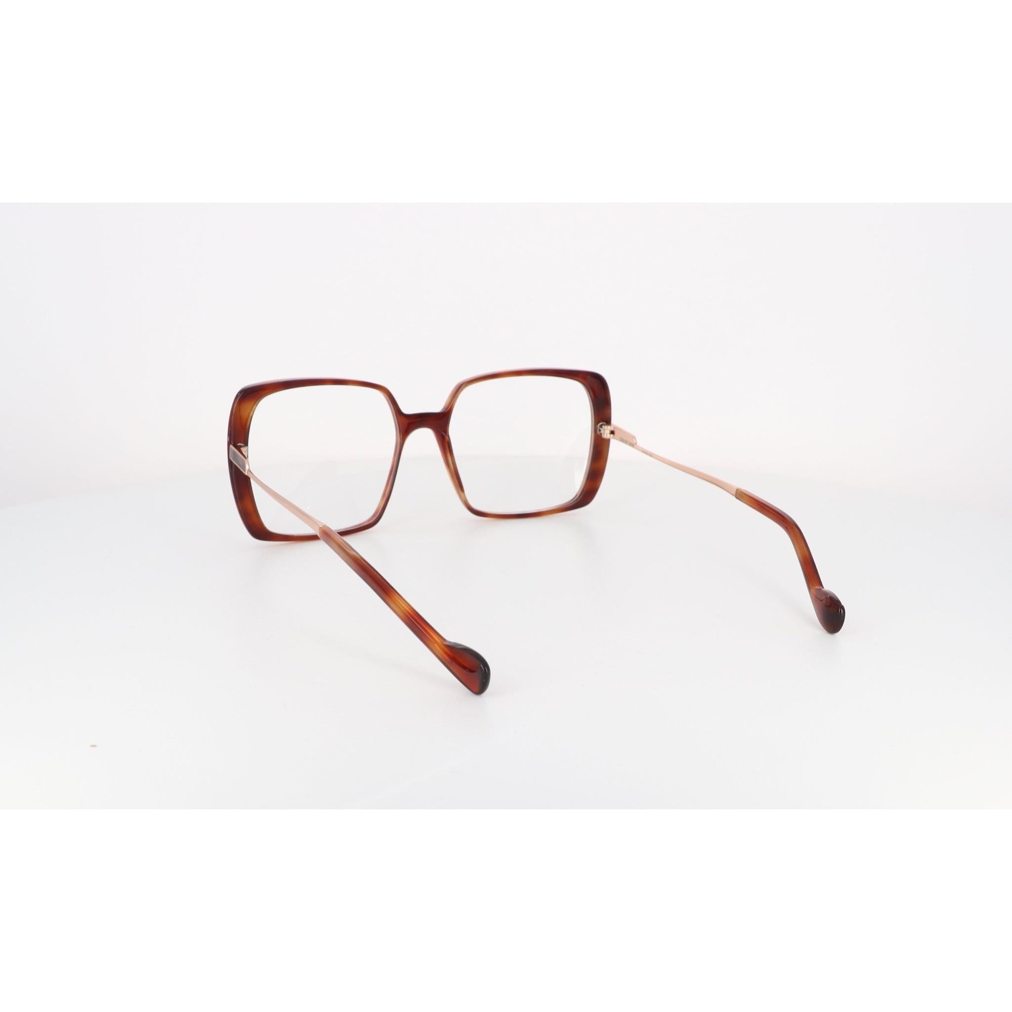 CAROLINE ABRAM IRINA - Jorge Oculista