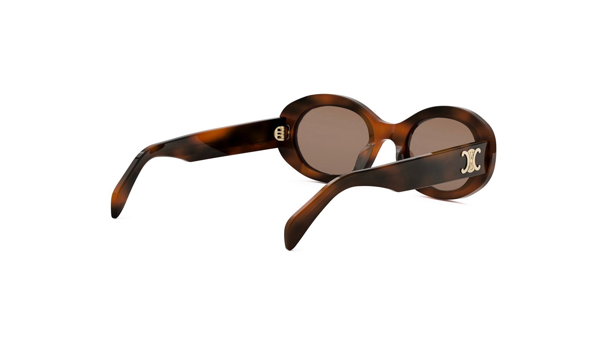 A pair of brown tortoiseshell sunglasses with a gold-colored logo on the frame.