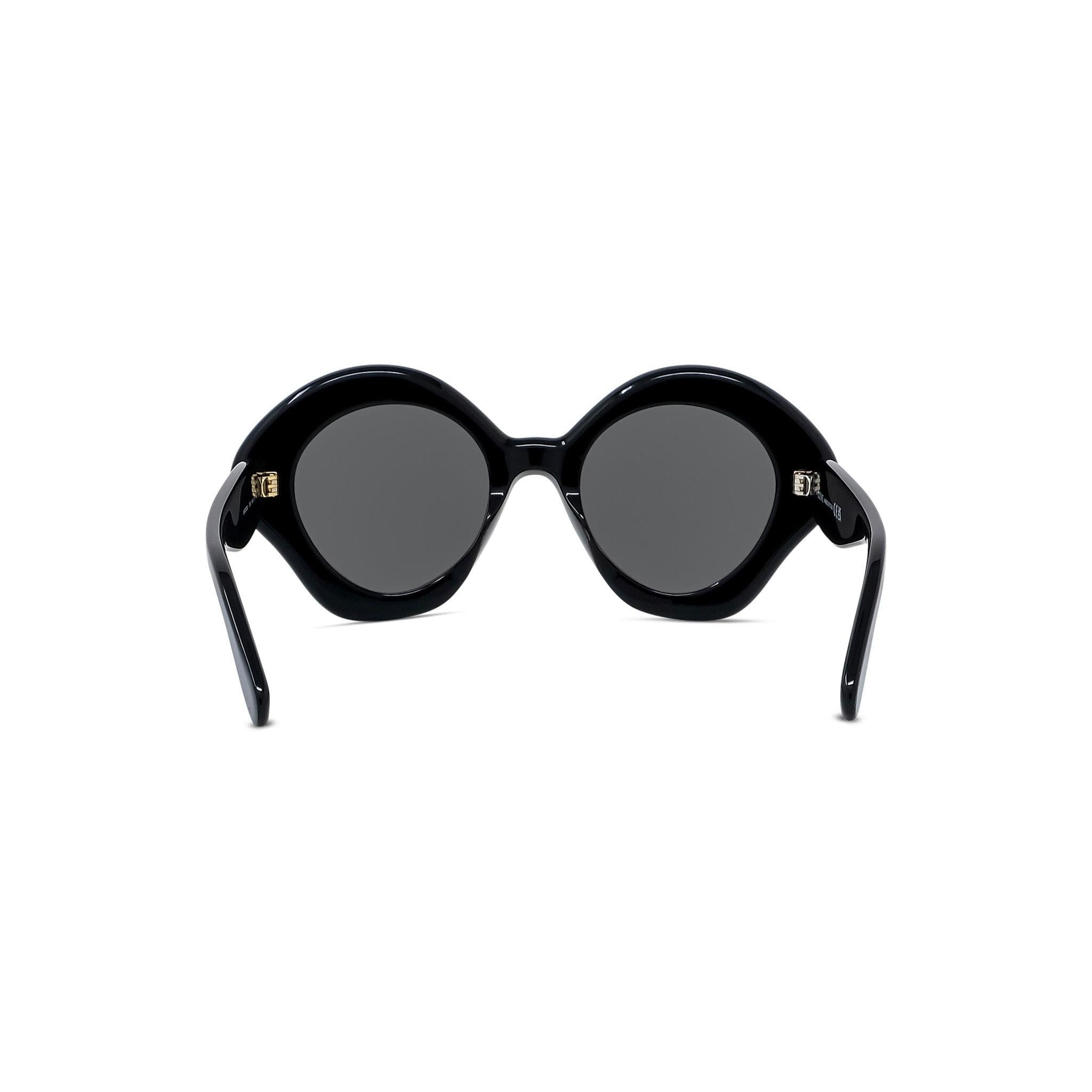 CURVY GEOMETRIC SUNGLASSES - Jorge Oculista