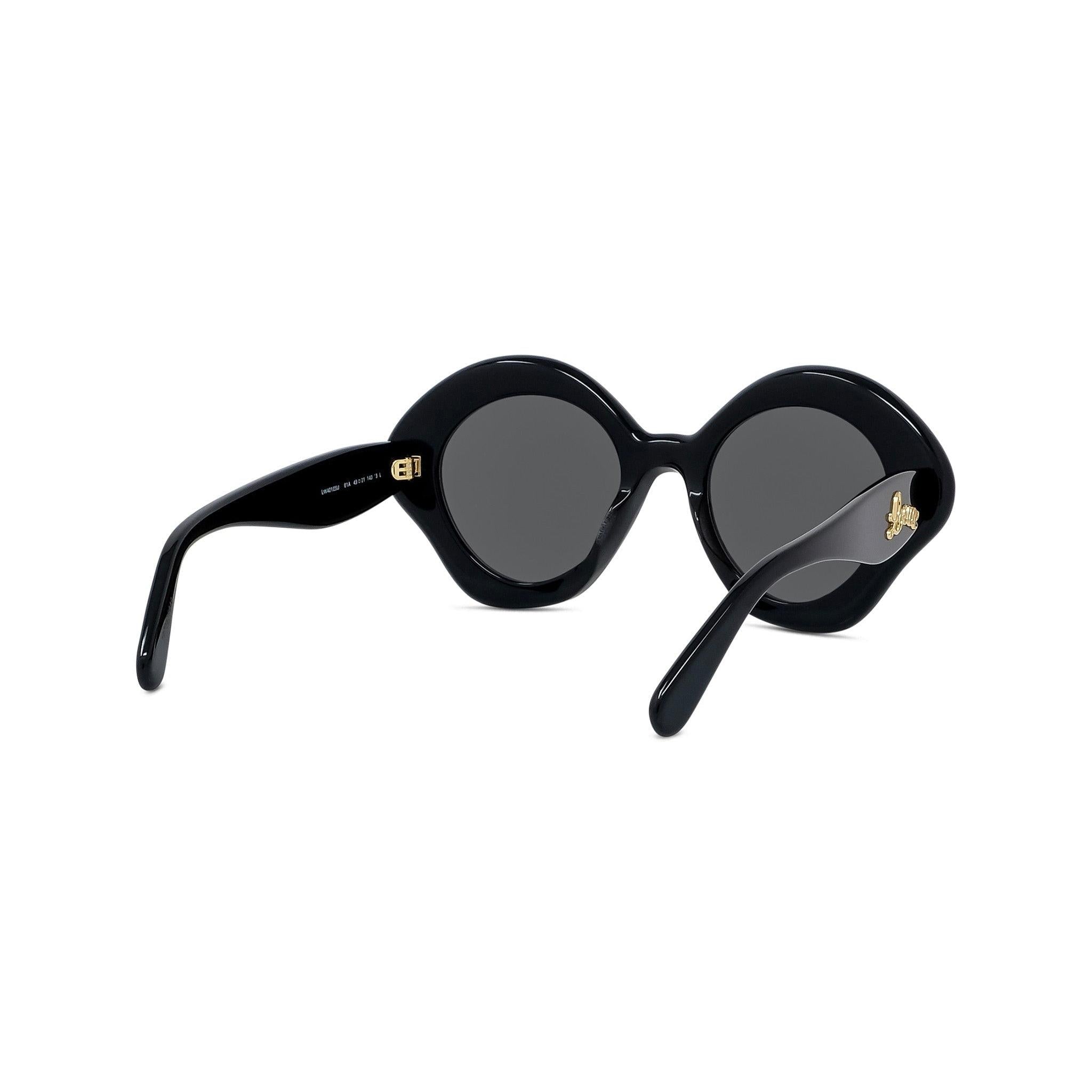 CURVY GEOMETRIC SUNGLASSES - Jorge Oculista