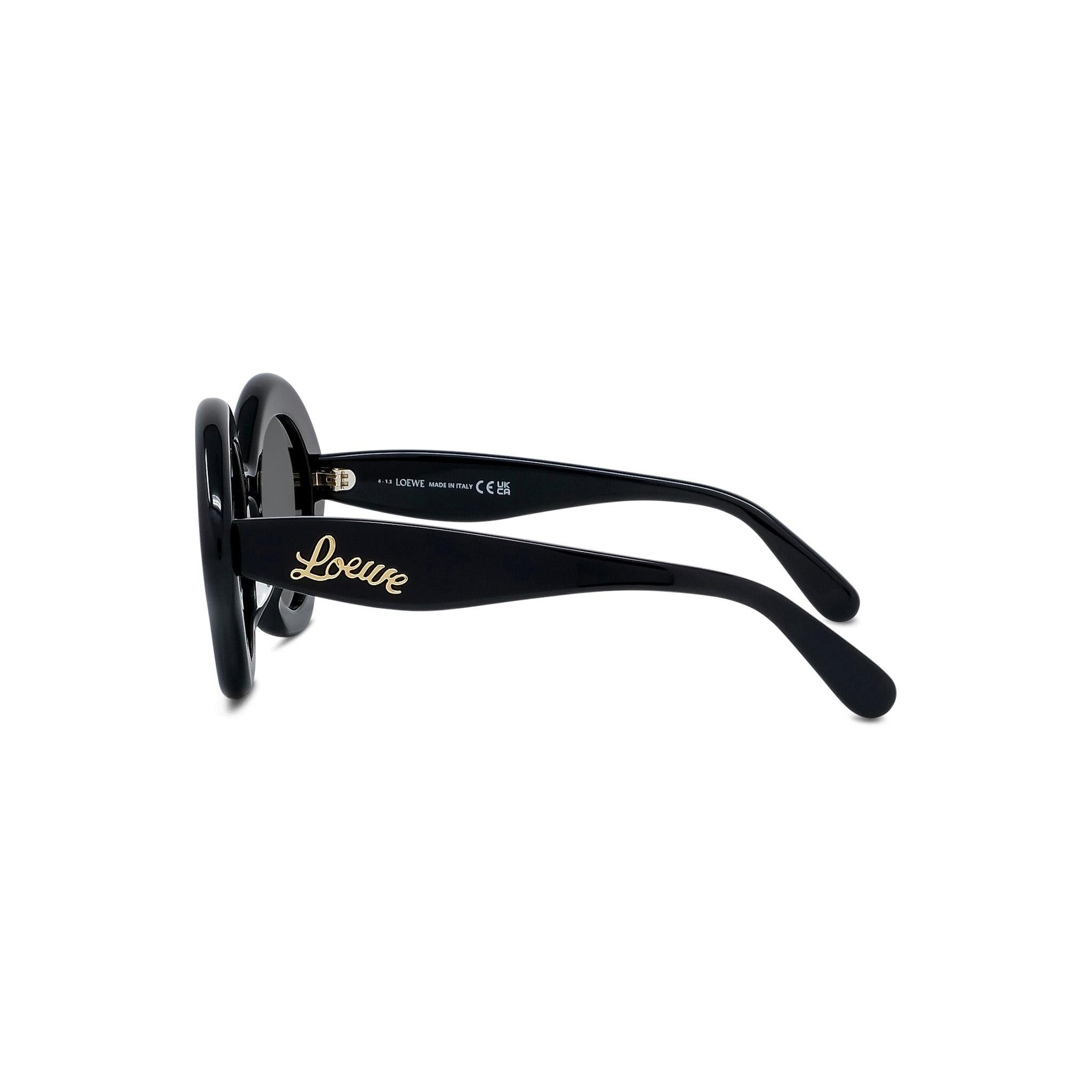 CURVY GEOMETRIC SUNGLASSES - Jorge Oculista