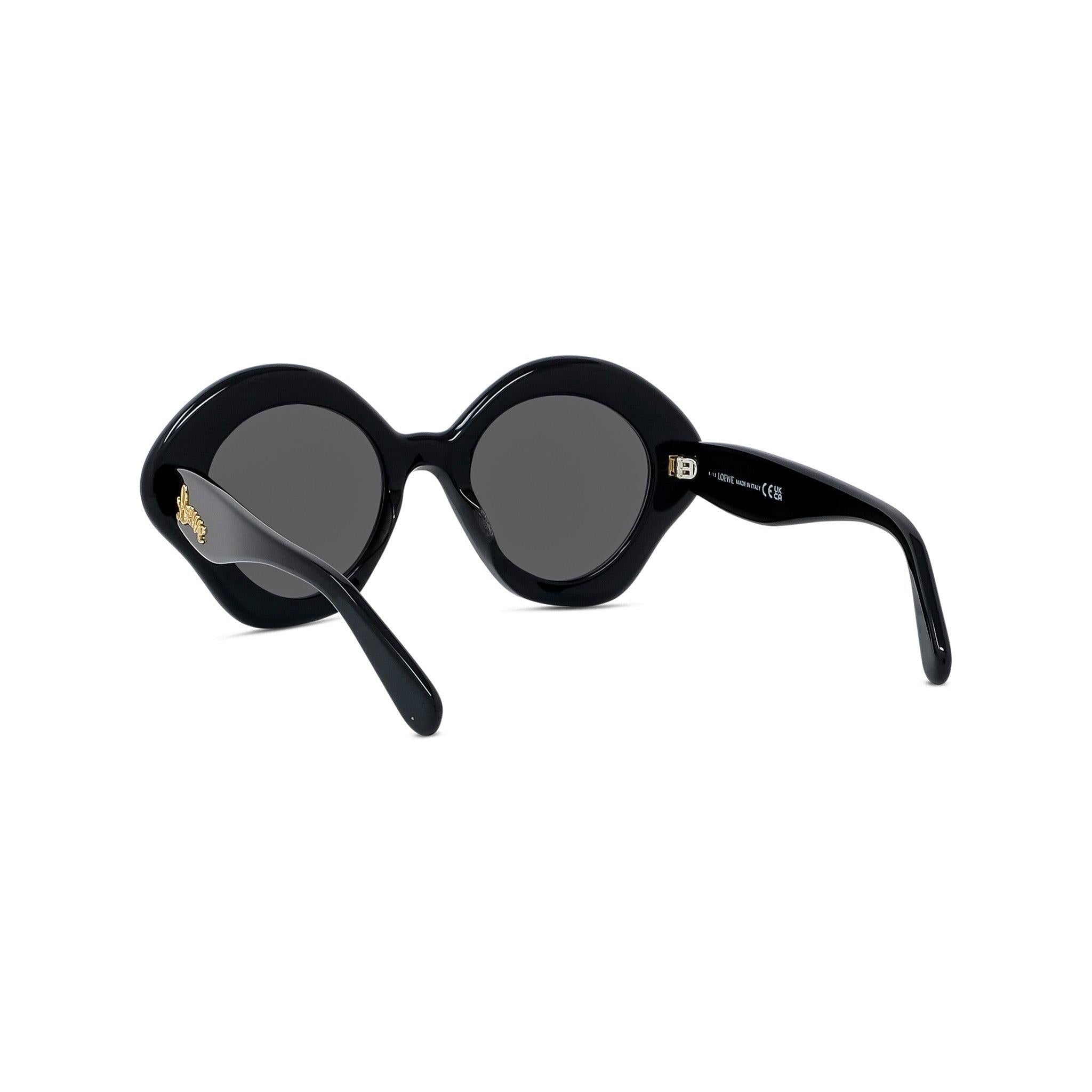 CURVY GEOMETRIC SUNGLASSES - Jorge Oculista