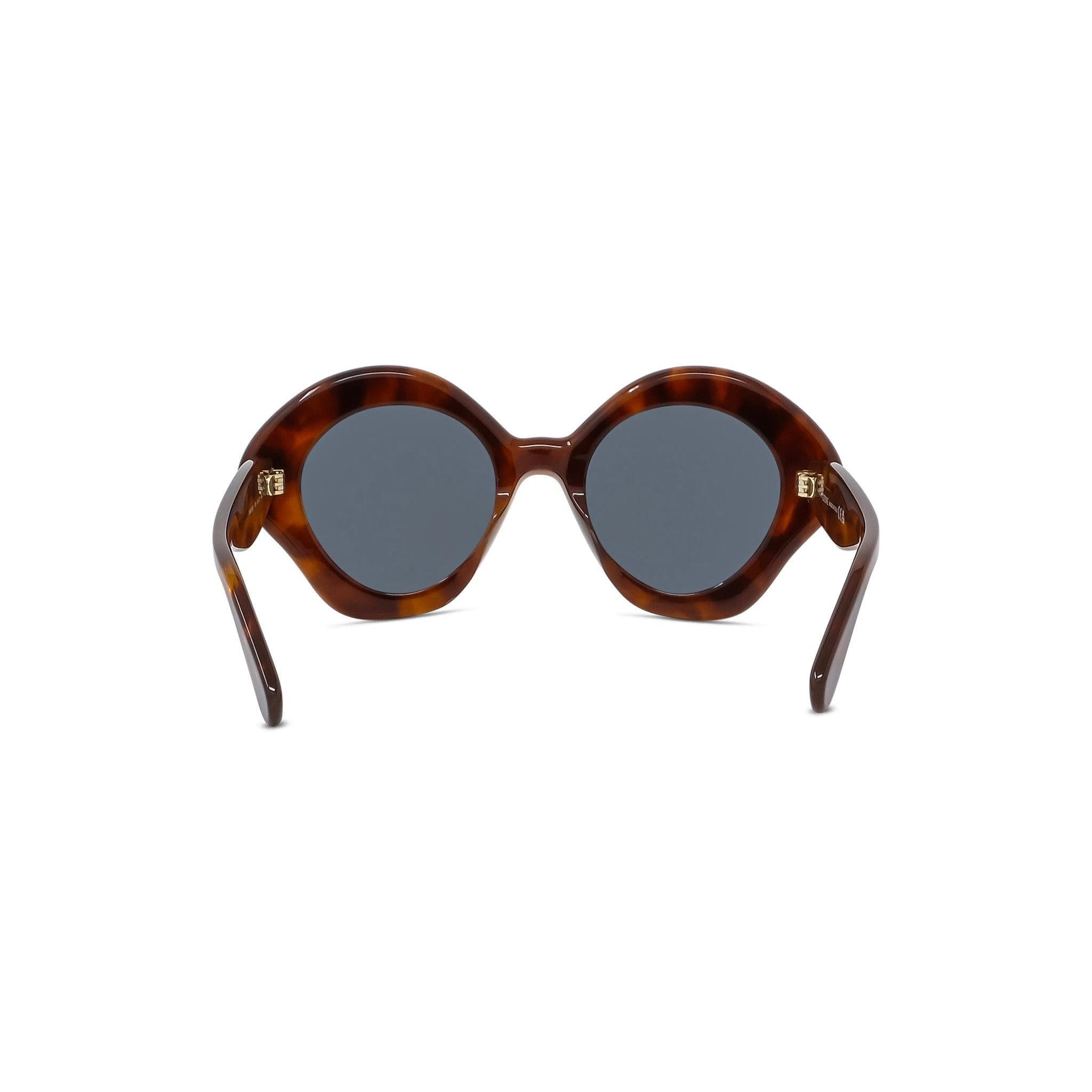 CURVY GEOMETRIC SUNGLASSES - Jorge Oculista