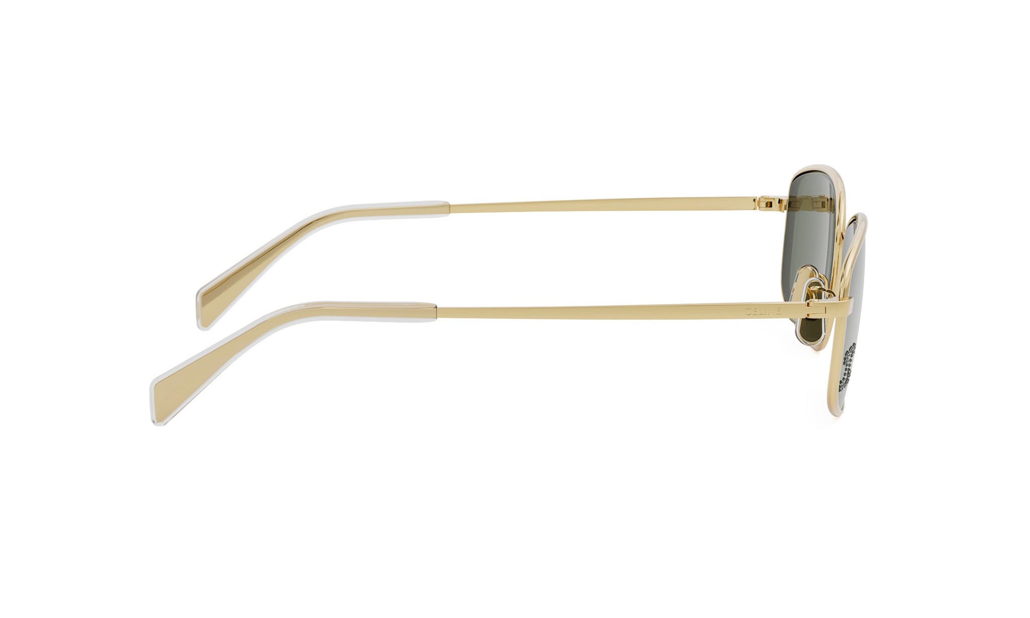 A pair of gold-colored sunglasses with a dark lens.