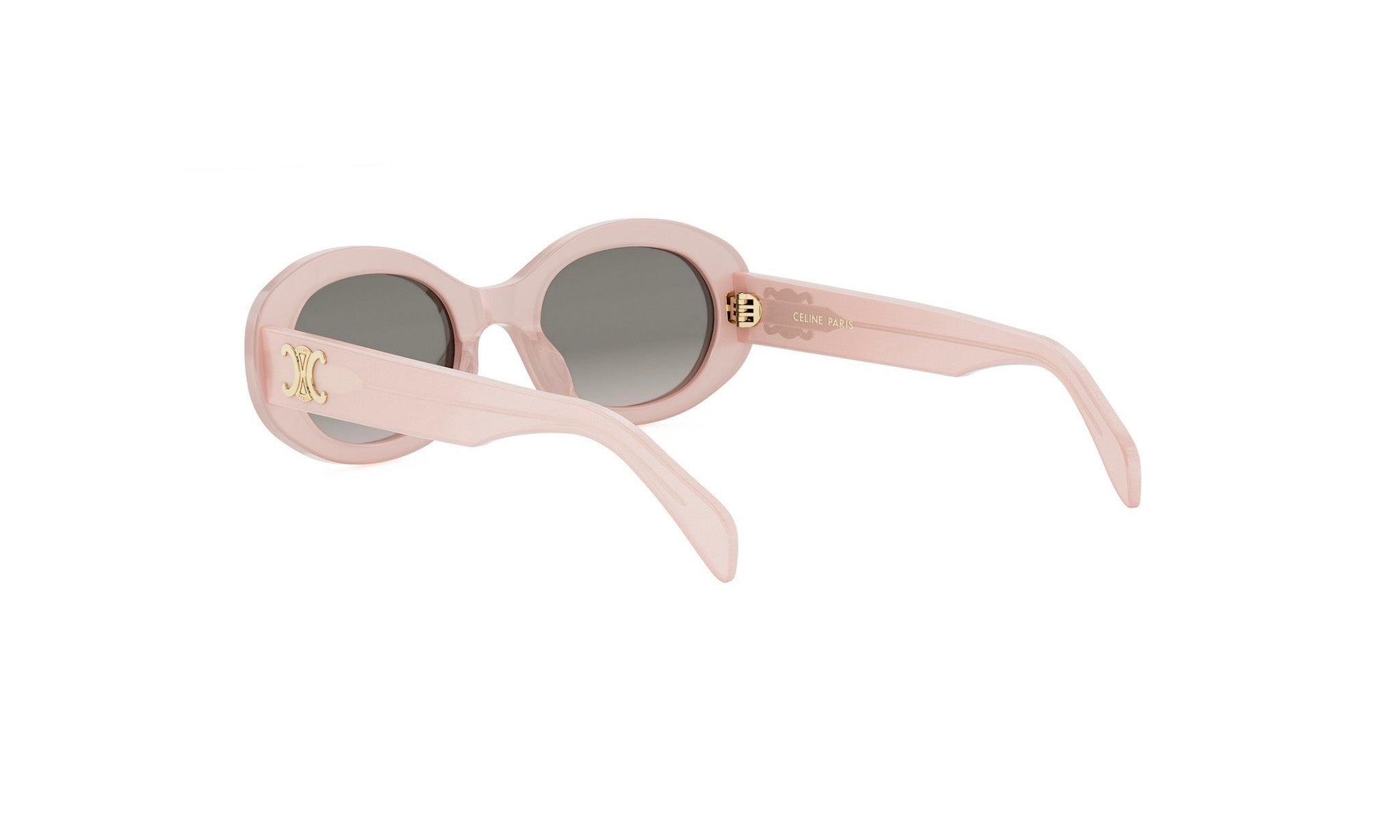 A pair of pink sunglasses with gold accents.