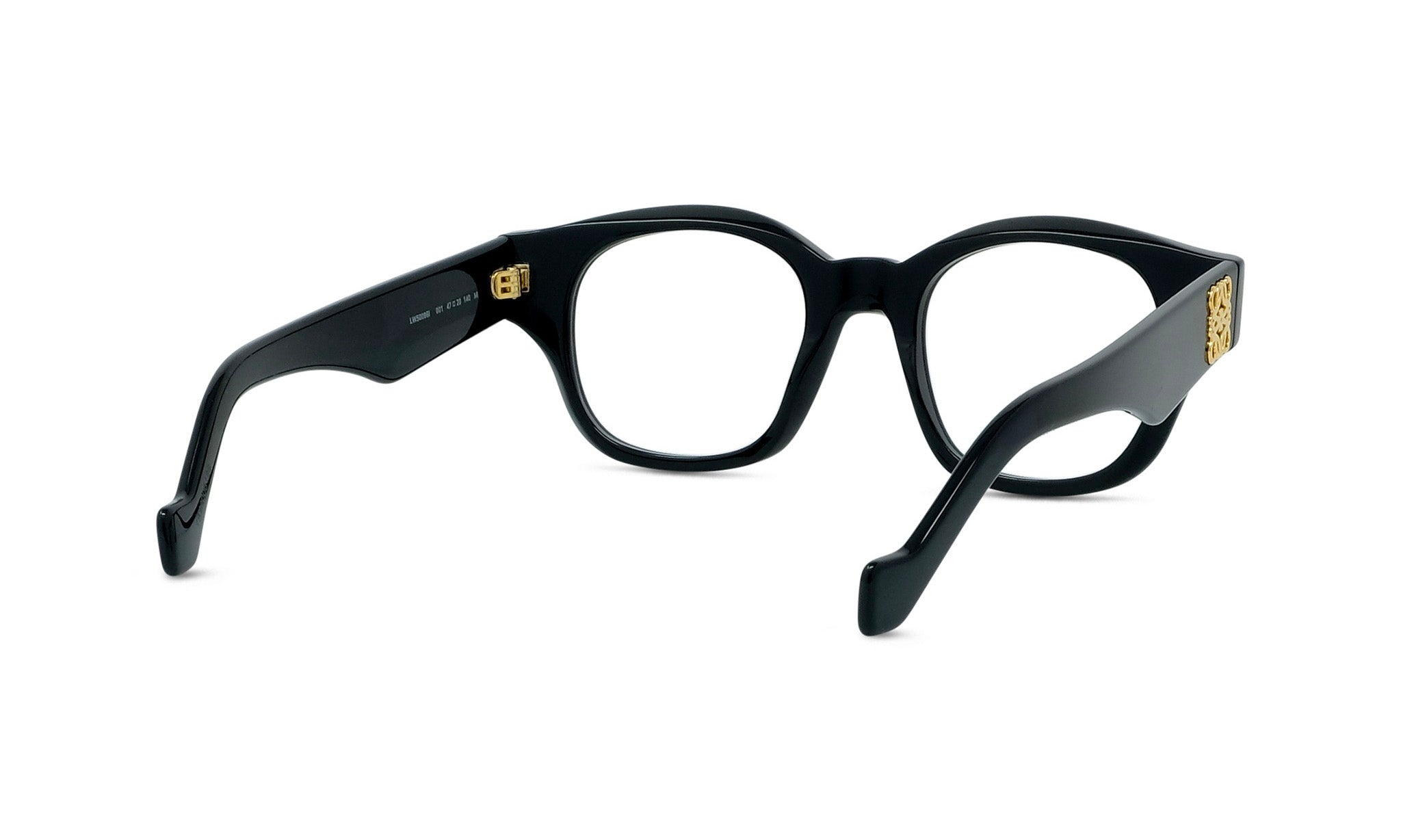 A pair of black-framed glasses with gold accents.