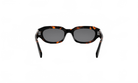 A pair of sunglasses with dark frames and a tortoiseshell pattern.