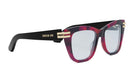 A pair of stylish, red-tinted glasses with gold-colored metal accents, featuring a black frame.